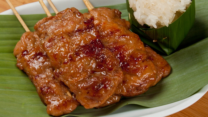 moo ping, juicy grilled pork skewers