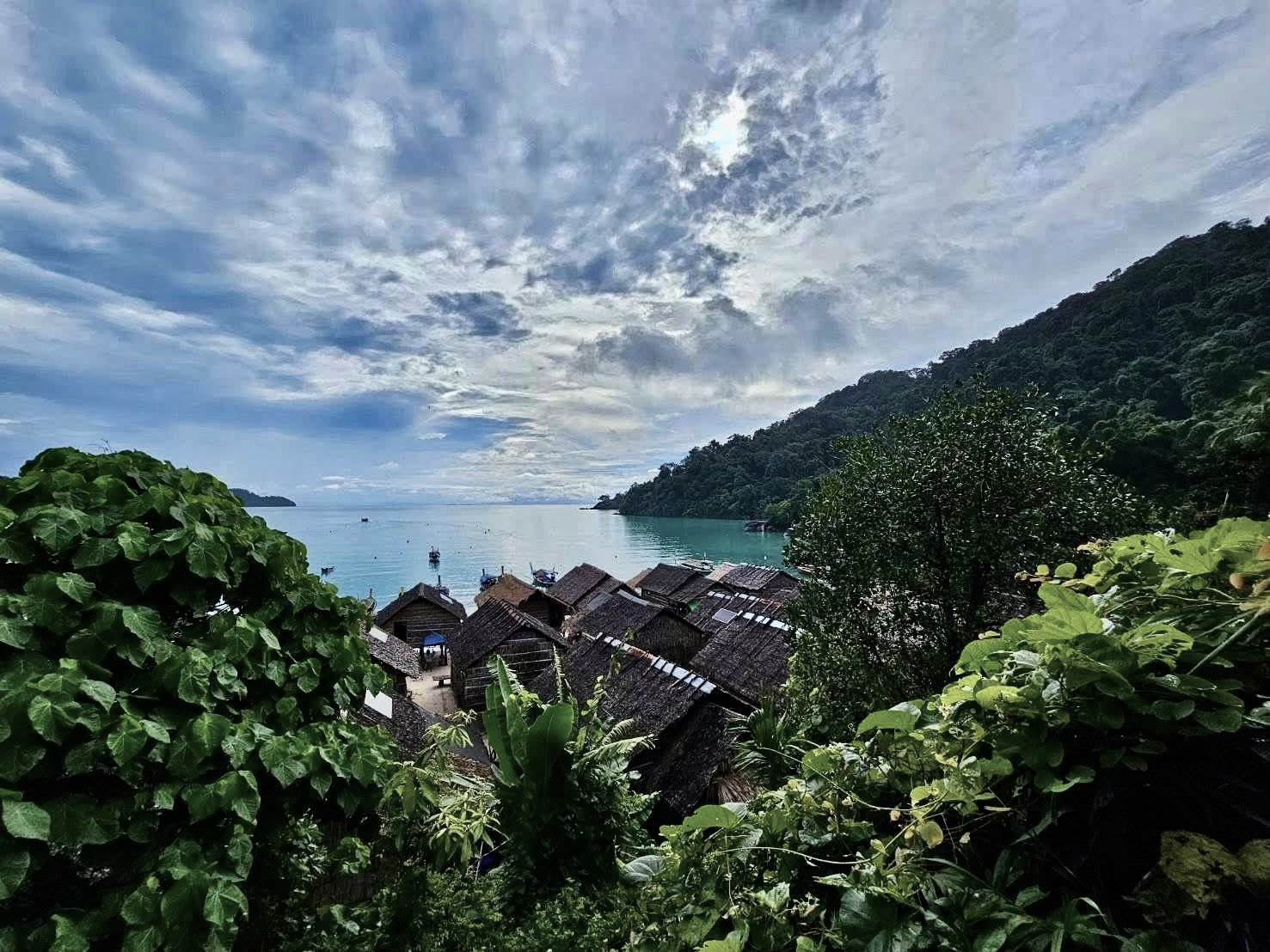 Moken village on Ko Surin Tai — wooden houses on stilts above the beach