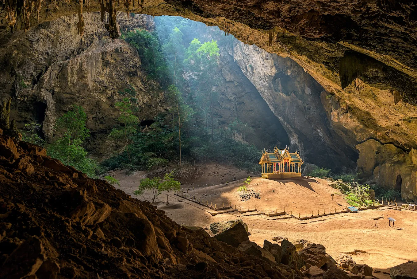 Light shaft through Phraya Nakhon Cave's collapsed ceiling — the natural spotlight, 60 minutes daily