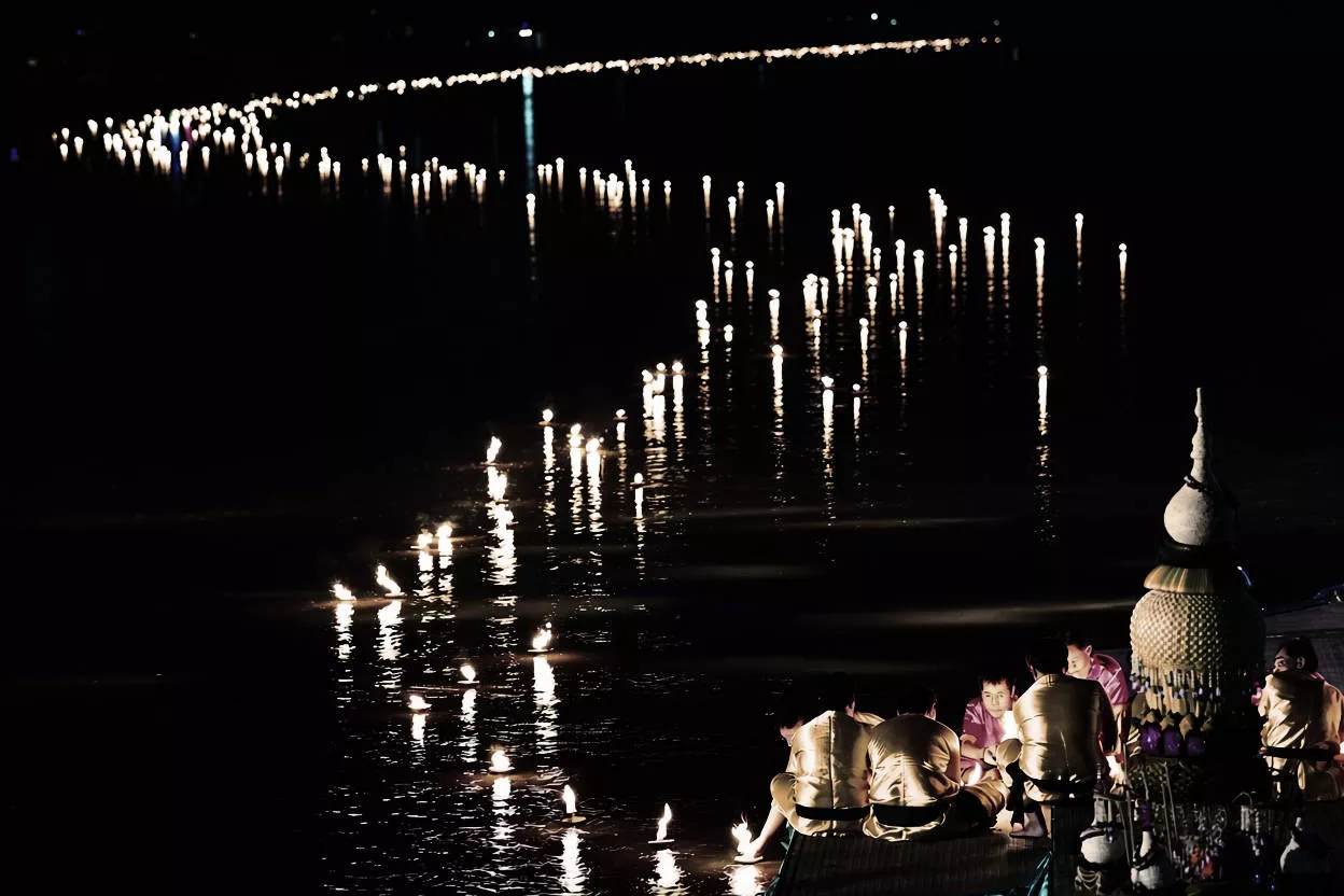 Loy Krathong Sai Festival in Tak Province — banana trunk train on river